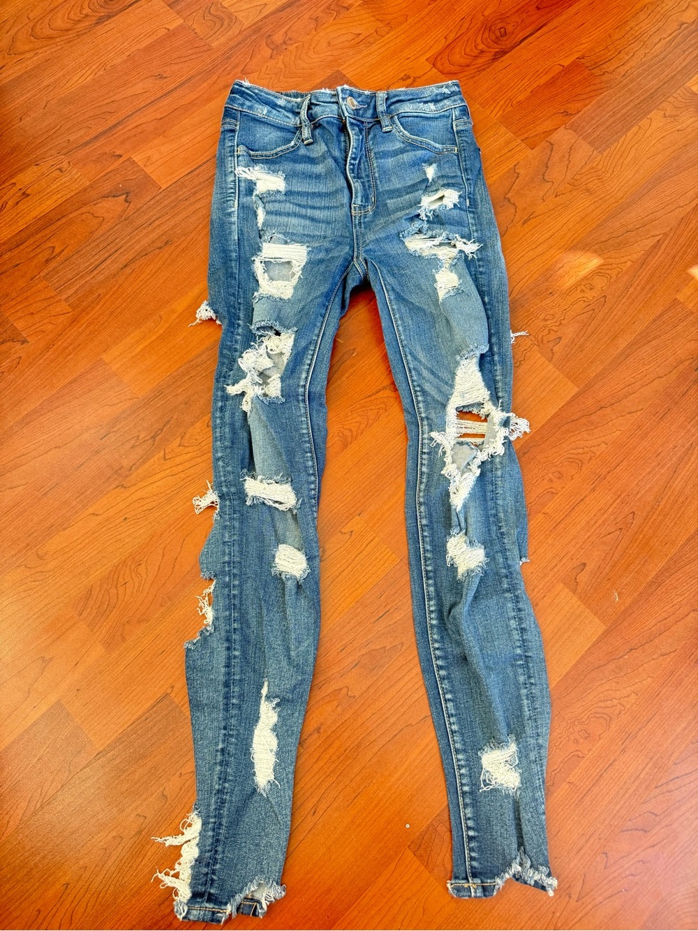 American Eagle Super Stretch distressed jeans, size 0